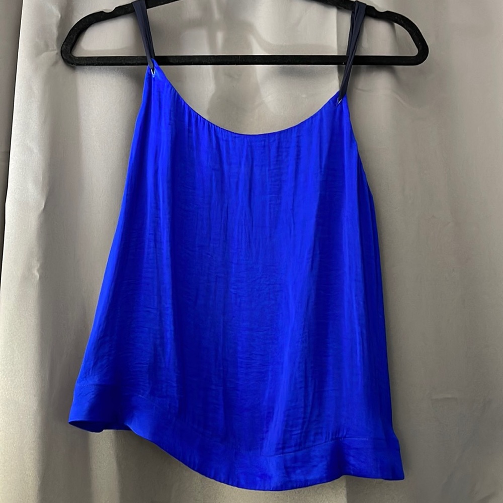 Blue tank top with black tie straps